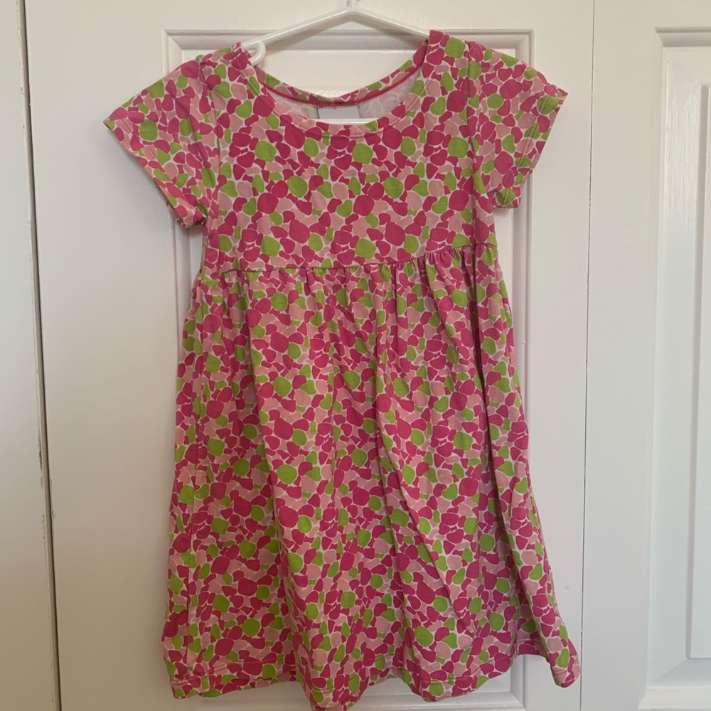 A spring/ summer pink and green patterned dress